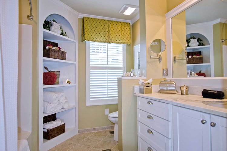 bathroom with white furnishings and large vanity