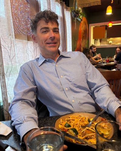 Man sitting at a table in a restaurant